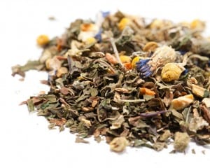 Yoni relax tea. tea leaves sit on a white background.