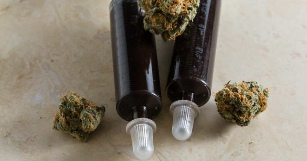 Cannabis - Oil - Concentrate - Dark drops - cannabis buds - dry flower - strain