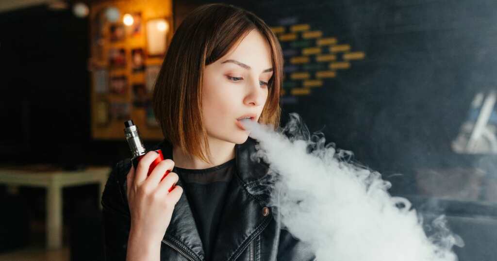 Woman vaping - sativa vape - best strain