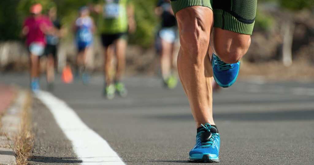 group of runners - runner legs - muscle recovery