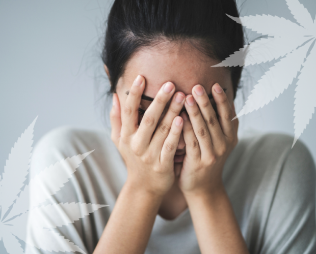 This image features a women suffering from anxiety for the article terpenes for anxiety.