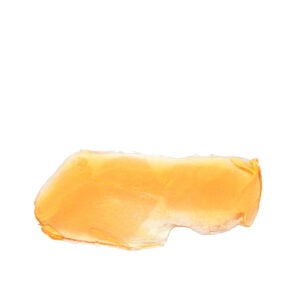 Shatter from Jungle Ridge. Orange glass like object on a white background.