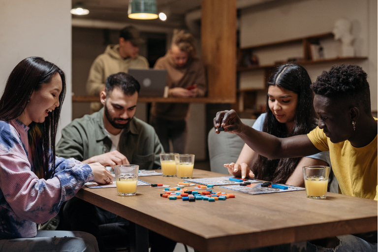 This image features adults playing weed games