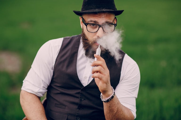 Man vaping his favourite tasting distillate