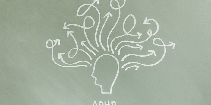Visual representation of ADHD. Many arrows point outwardfrom a drawing of the head.