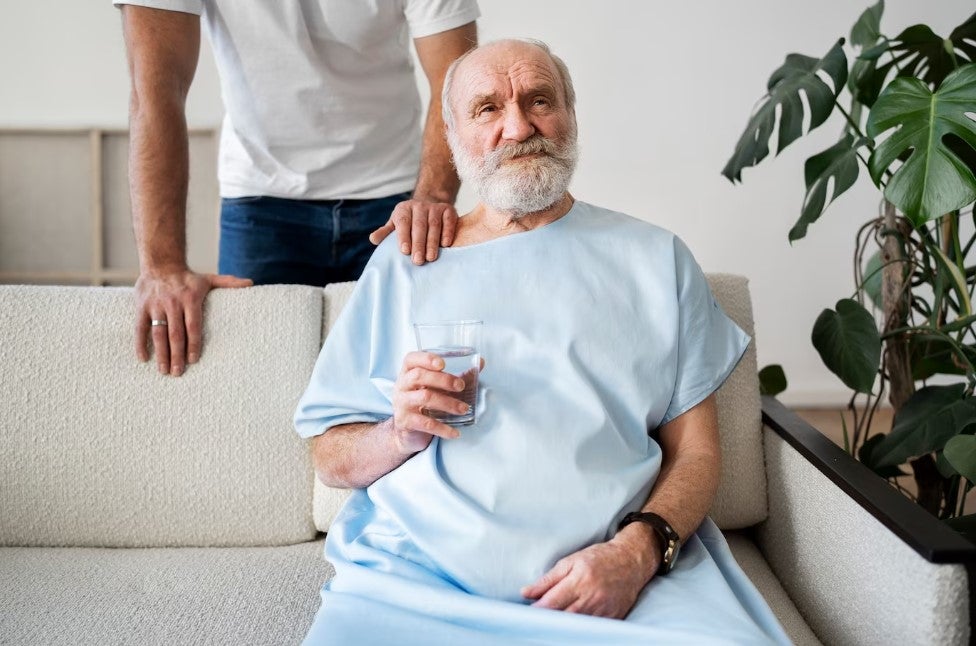 Parkinson-elderly-man-relief-glass-water