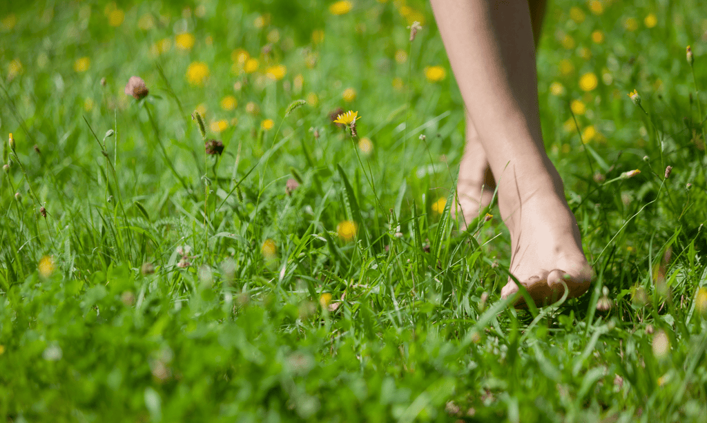 walking barefoot on the grass