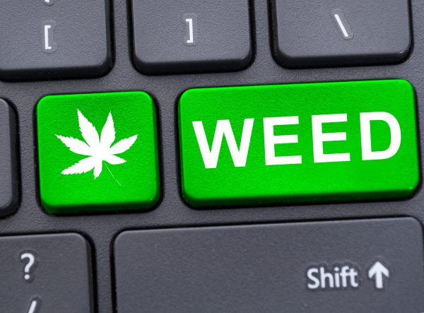 weed inscription on keyboard pad