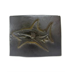 Slab of Hive Shark Hash with a shark design embossed into its grey surface, newer photo