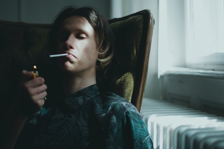 man smoking alone