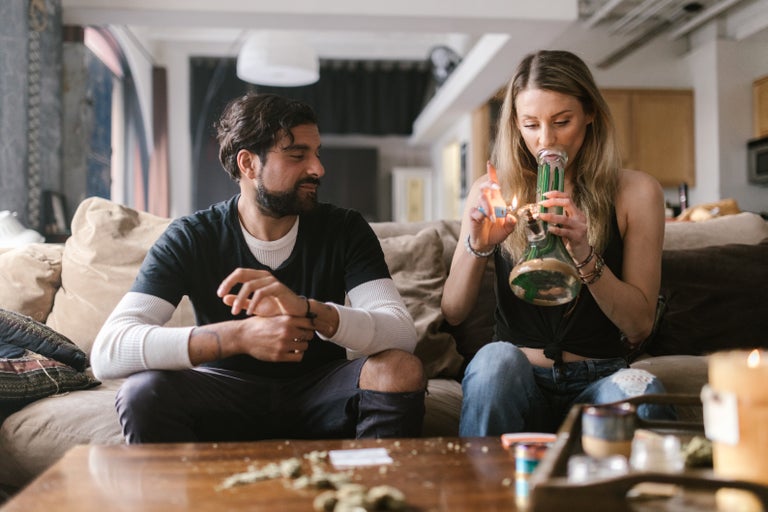 weed dabbing man and woman