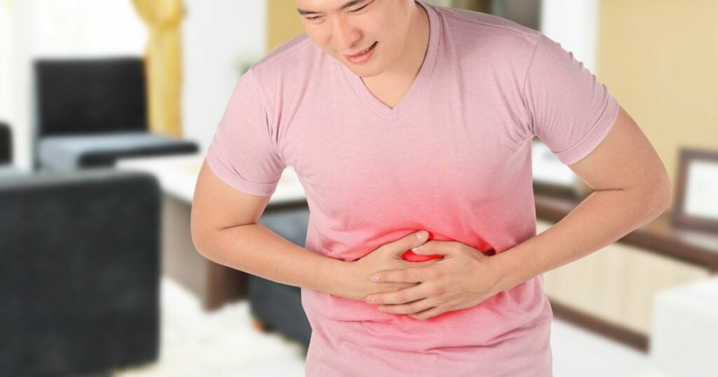 IBD Inflammatory  Bowel Disease - man - stomach ache - pain