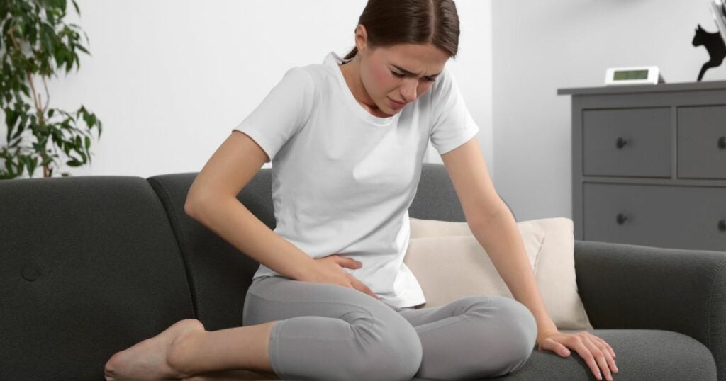 Woman in pain - menstrual cramps - cannabis - relief
