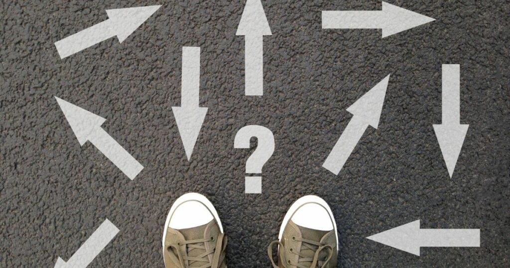 Image of someone standing on concrete. There are arrows pointing in direction to depict all the options they have.