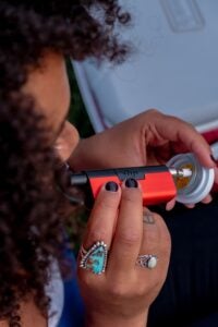 Vape with metal rod to heat up and smoke concentrates. 