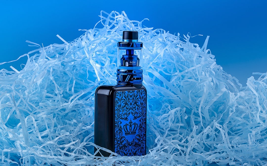 Blue vape box, a nicotine vape with a box shaped handle with a bulky mouth piece.